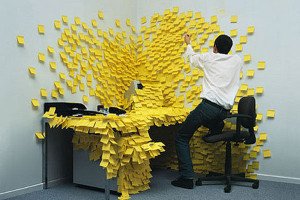 Multiprogramming and Multitasking : A man is busy with numerous job cards pasted everywhere